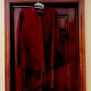 Like new - No Iron - Chicos hidden button front blouse. Color is wine/merlot.